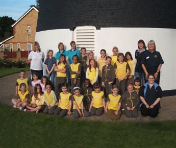 A group of Brownies outside the mill